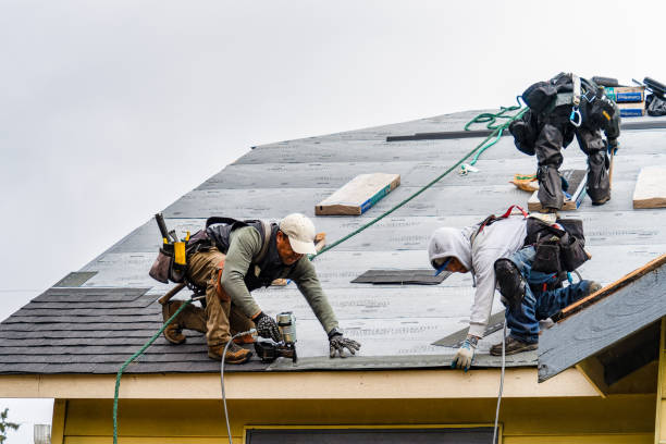 Professional Gutter Installation technician working in Thompson, OH